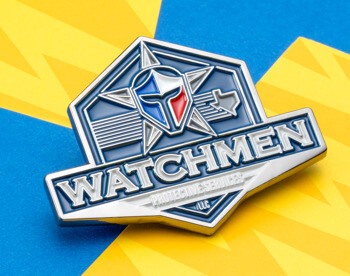 Shield-shaped coiin featuring the Watchmen logo with a star, knight helmet, and blue and white enamel detailing on a blue and yellow background.
