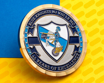 Blue Knights NJ VIII LE MC challenge coin celebrating 45 Years of Excellence with an enameled knight emblem and faceted gold edge.
